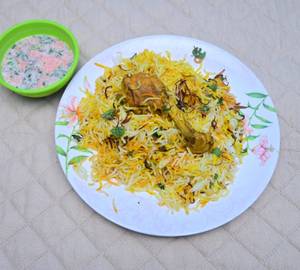 Chicken leg piece biryani RAITA+salad (1leg pcs)