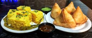 4 Pcs Samosa + 250 Grams Dhokla