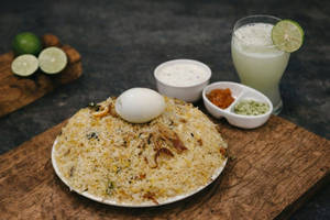 Half Chicken Biriyani+ Egg+ Raitha+ Pickle+ Lime Meal
