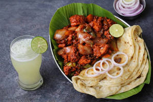 Porotta(3 Nos.)+ Chilli Chicken+ Salad+ Fresh Lime Meal