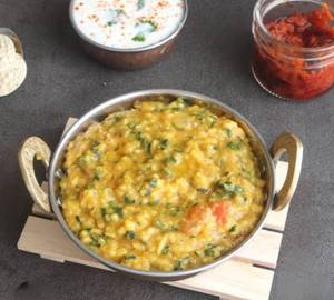 Masala Khichdi With Papad And Achar.