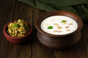 Curd Rice With Pacha Milagai Kozhi Peratal