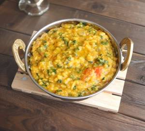 Plain Khichdi With Papad And Achar .