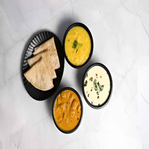 Besan Gatte Ki Sabji With Phulka Roti & Khichdi Kadi