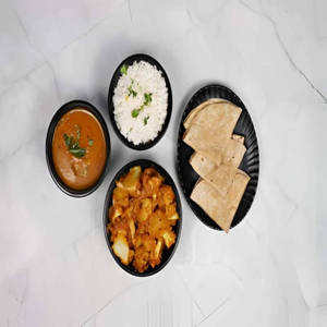 Flower Potato Sabji With Phulka Roti & Dal Rice