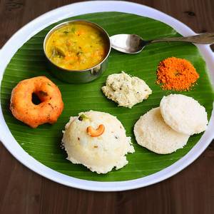 Ghee Pongal (Half) + Idly (2) + Poori Masala (2) + Vada (1)