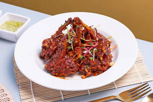 Chicken Lollipop Tossed In Choice Of Sauce