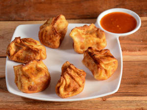 Fried corn and cheese momos