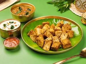Millet Ghee Curryleaf Podi Tossed Idli