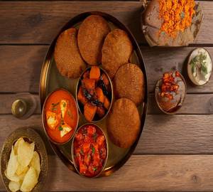 Navratri thali 500 gram aalu ki sabji with desi ghi 250 gram dahi 15 peace kutton ke pakode salad