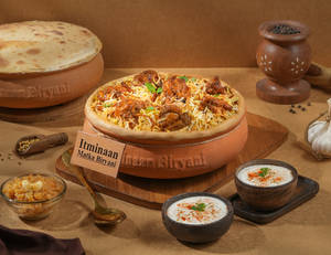 1 KG Original Chicken Matka Biryani + FREE Dessert