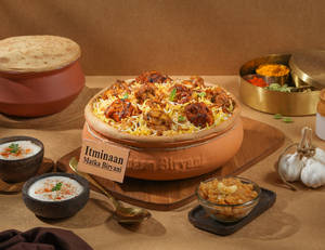 1 KG Overload Chicken Matka Biryani + FREE Dessert
