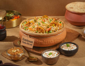 1 KG Veg Nawabi Matka Biryani + FREE Dessert