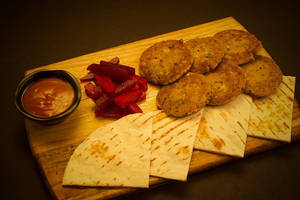 Hummus Falafal Pita Bread And Pickle