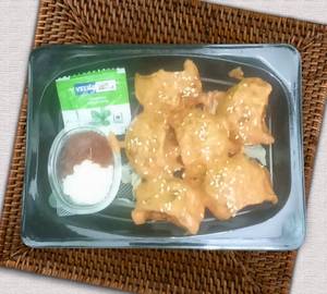 Chicken Tandoori Sauce Momos 8 Pcs