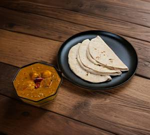 4 tawa roti with chicken curry