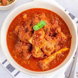 Mutton fried in eggs