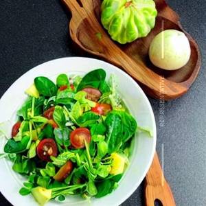 Green salad a of fresh seasonal greens [medley]