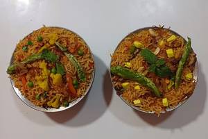 Veg Biryani Sampler [200 g] With Paneer Biryani [200 g]