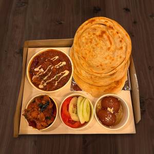 Kodi Egru (Chicken Curry) With Malabar Paratha (5 Items)