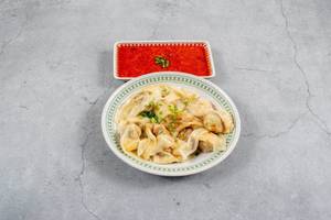 Veg Steamed Wonton With Garlic Sauce