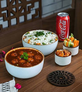 Manchurian In Signature Gravy + Classic Veg Fried Rice + Can