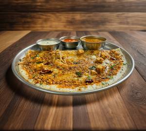 Cheese Podi Dosa (Served With White Chutney, Laal Chutney And Sambhar)