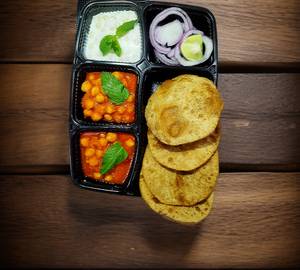 Chole gravy with 4 poori