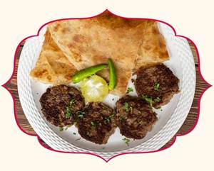 Tunday Black Buffalo Kabab 4 Pcs + 2 Pcs Mughlai Paratha