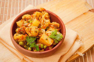 Aloo Gobhi Matar (seasonal)