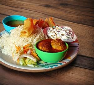 Basmati Rice, 2 Egg Curry, Aloo Chokha, Dal, Salad, Pickles, Dahi