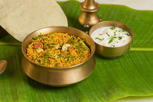 Dakshini Veg Biryani With Raita