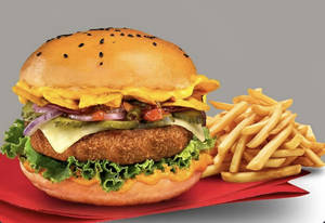 Macho Nacho Veg Burger (served With Fries)