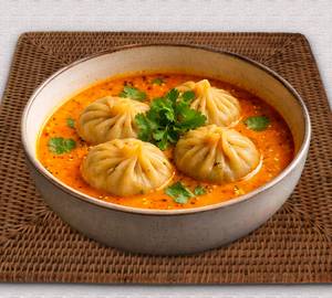 Chicken Jhol Momos ( 4 Pieces )