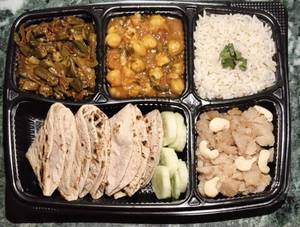 Bhindi + Chitte Chole + Butter Roti + Jeera Chawal + Dahi