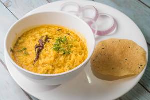 Dal Khichdi + Roasted Papad + Onion
