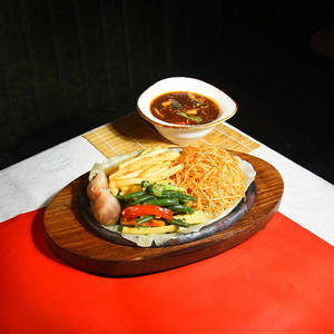 Exotic Vegetable & Paneer In Black Bean Basil Sauce Sizzle