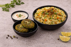 Veg Biryani + Hara Bhara Kebab + Raita Meal [serves 1]