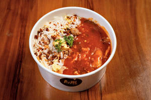 Burned Garlic Rice With Chicken In Schezwan Sauce