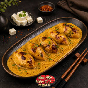 Achari Gravy Baked Paneer Momos 5 Pcs