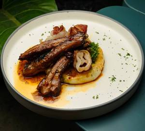 Bacon-glazed ribs