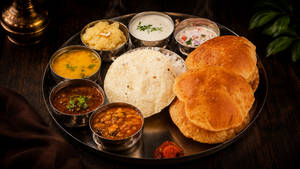 Super Delux Maharashtrian Veg Thali - Puri