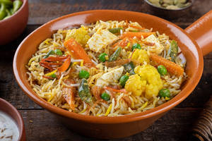 Dum Veg Biryani Served With Raita & Salad