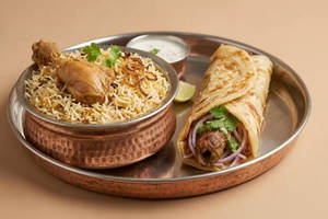 Muradabadi chicken Biryani 1pc + 1 Mutton kebab roll