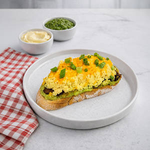 Artisan Avo Toast With Creamy Cheddar Scramble