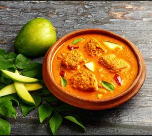 Goan Coconut Mango Fish Curry .