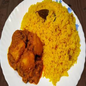 Basanti Pulao With Aloo Dum