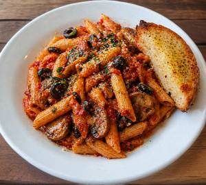 Penne With Mushroom And Olives