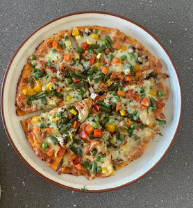 Seasonal Green Artisan Pizza