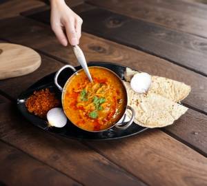 Sev Tamatar Sabzi With 3. Butter Roti+Onion